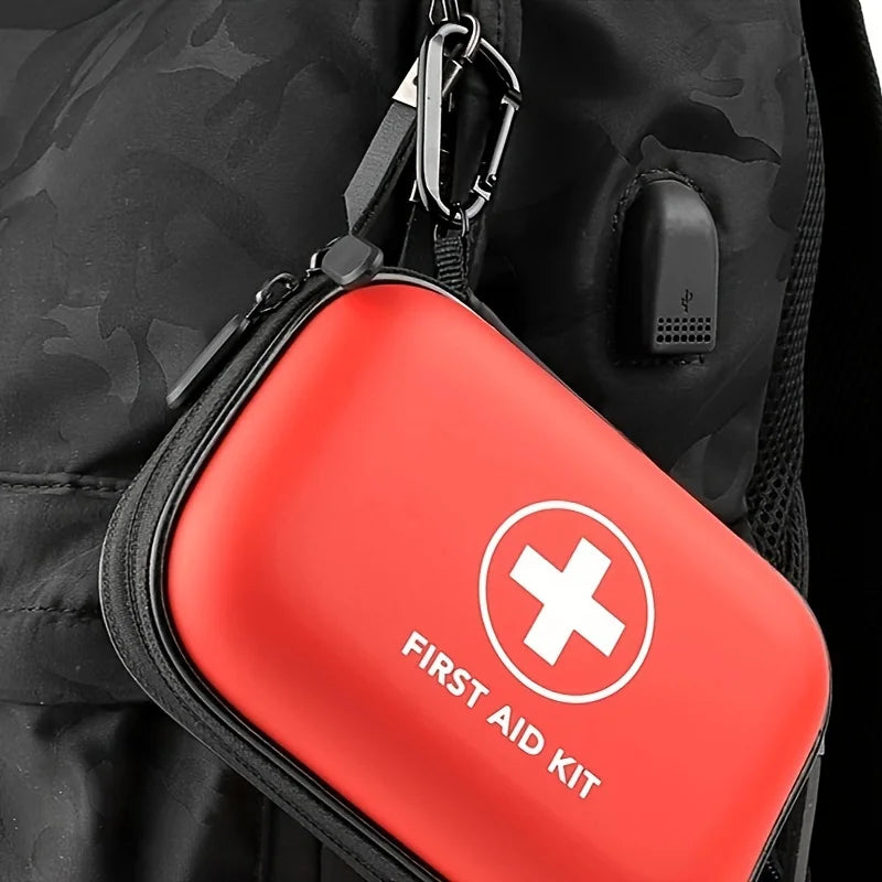 Kit de premiers secours compact SONORA avec bandages, pansements et outils essentiels, pour les urgences et la sécurité.